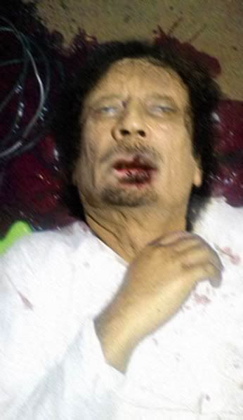 [Image: gaddafi-dead-or.jpg]
