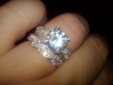 /></a></p> <p>Just thought I'd share my pics with those of you who may still be on the fence about ordering this beautiful ring! When I was at Publix doing my shopping yesterday, this ring was flashing and sparkling under their lighting. I noticed a lot of ladies glancing at my hand! It makes me so proud to own a Ripka wedding set! J-271011</p> <p>Pepper and Roxie I saw your thread. I hope this helps you both out.<img src=